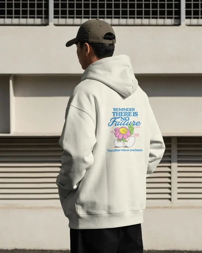 Back view of a cream graphic hoodie